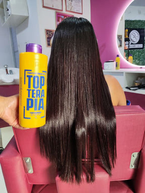 Aplicação profissional da Progressiva Orgânica Topterapia 1L em salão de beleza